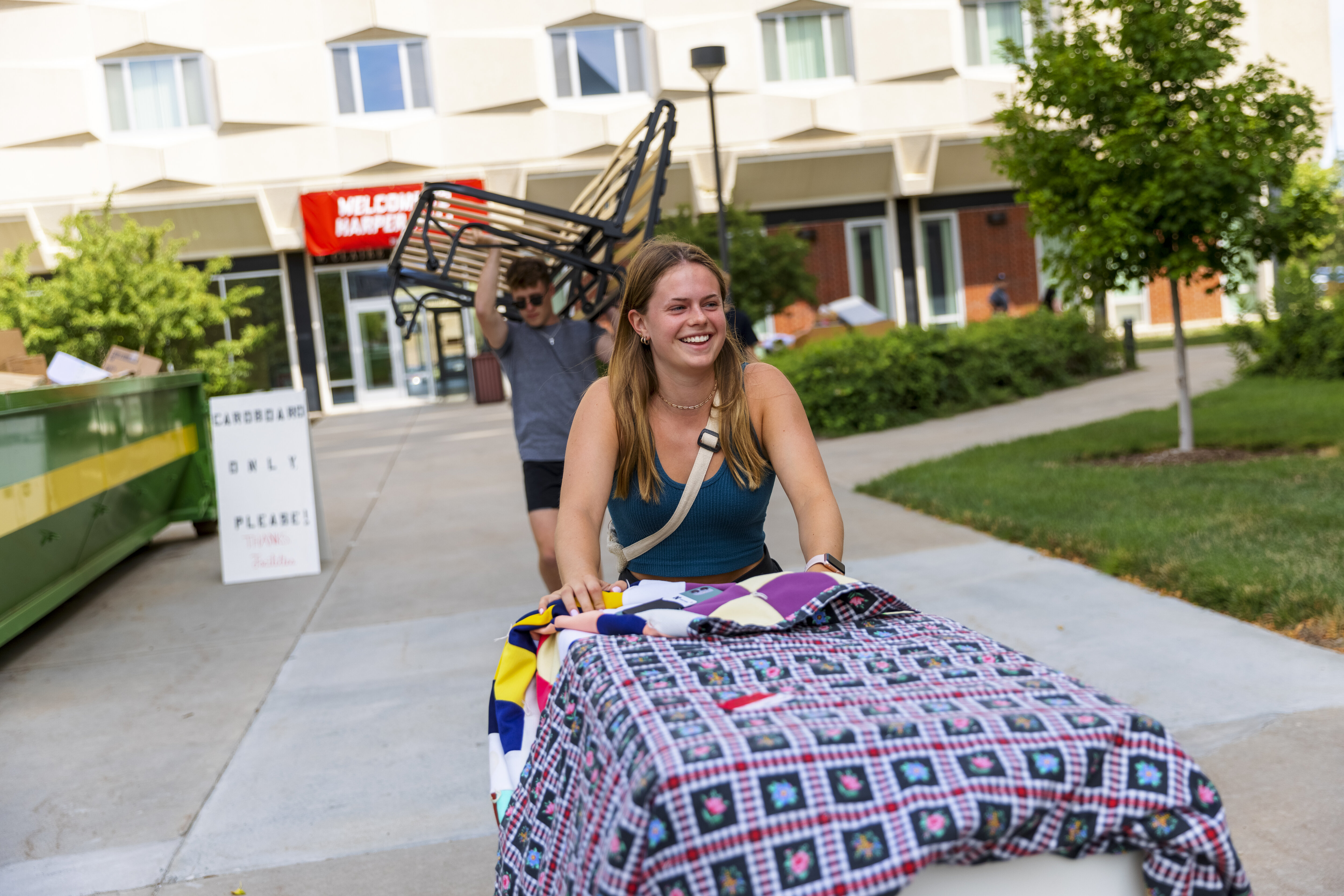 Student moving their belongings into the residence halls.