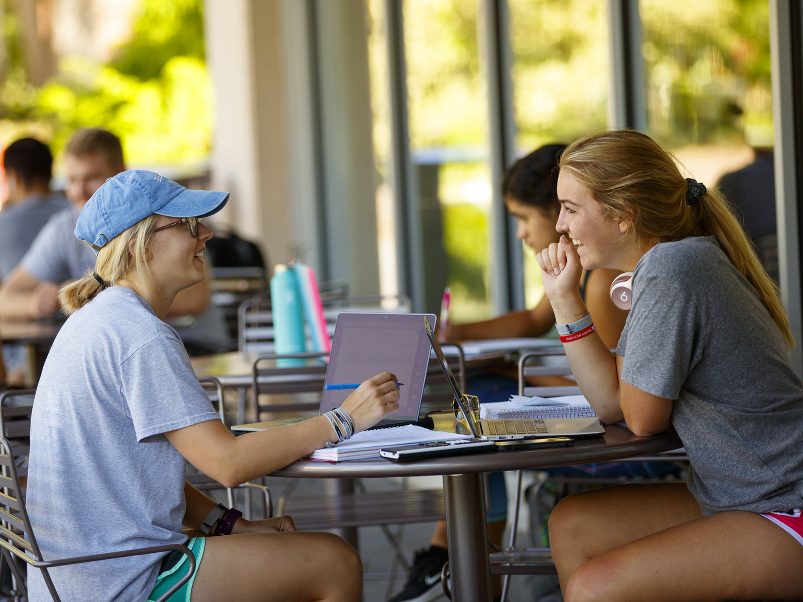 Students outside in sunny weather