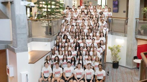 A group picture of the 2025-26 Resident Assistant Team, taken in the Nebraska East Union.