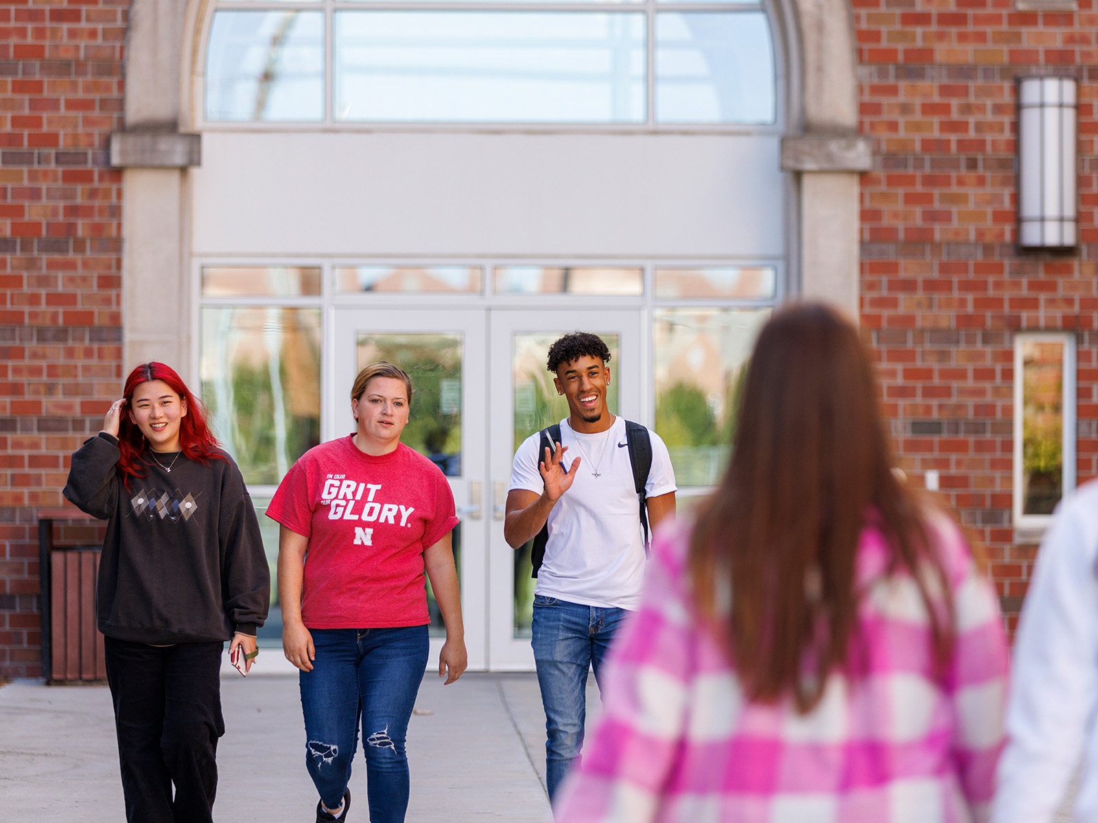 Students outside in sunny weather